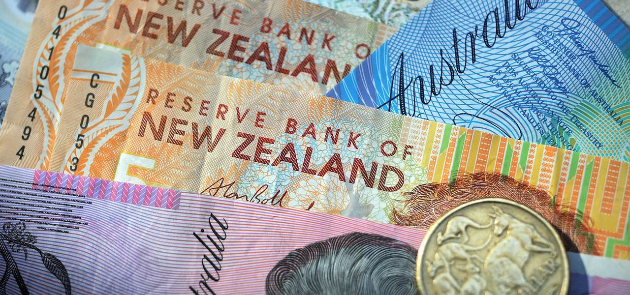 Kiwi slumps on dismal NZ data, Aussie stands still 