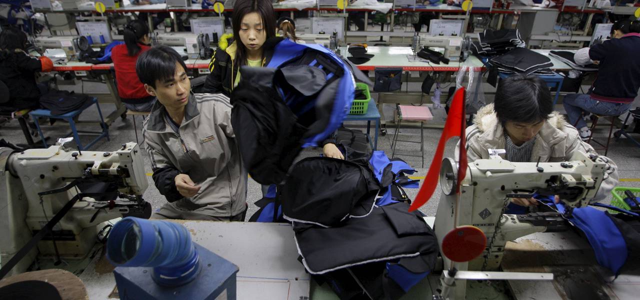 China November factory surge slows to 5-month minimum 