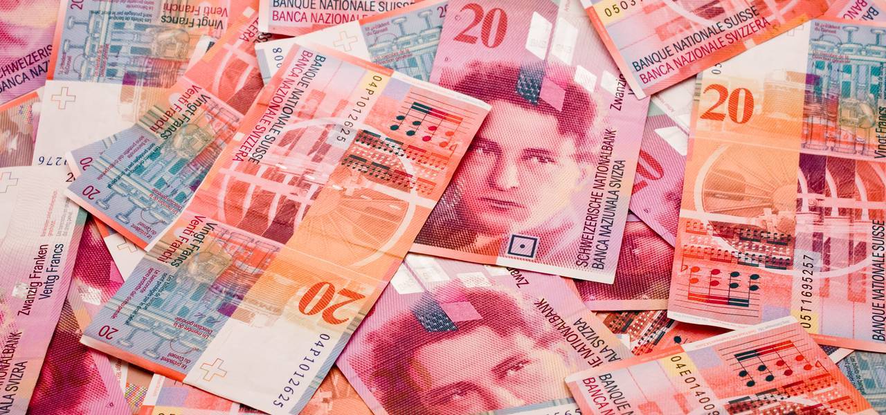 Swiss franc leaps in risk-off trade