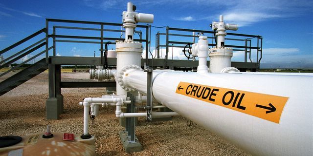 Crude ticks up, gasoline drops as refineries get back after Harvey