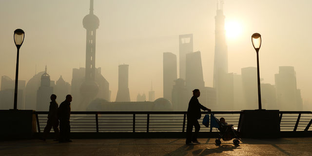 Chinese economy loses some steam as investment surge hits 18-year minimum