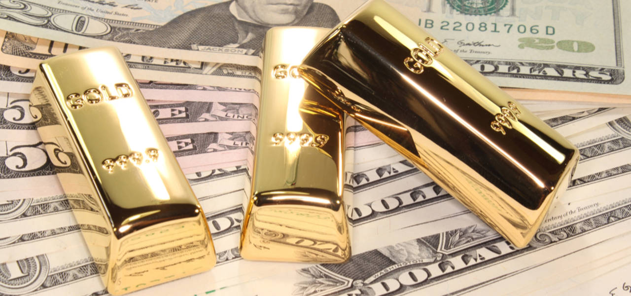 Gold goes down as greenback surges 