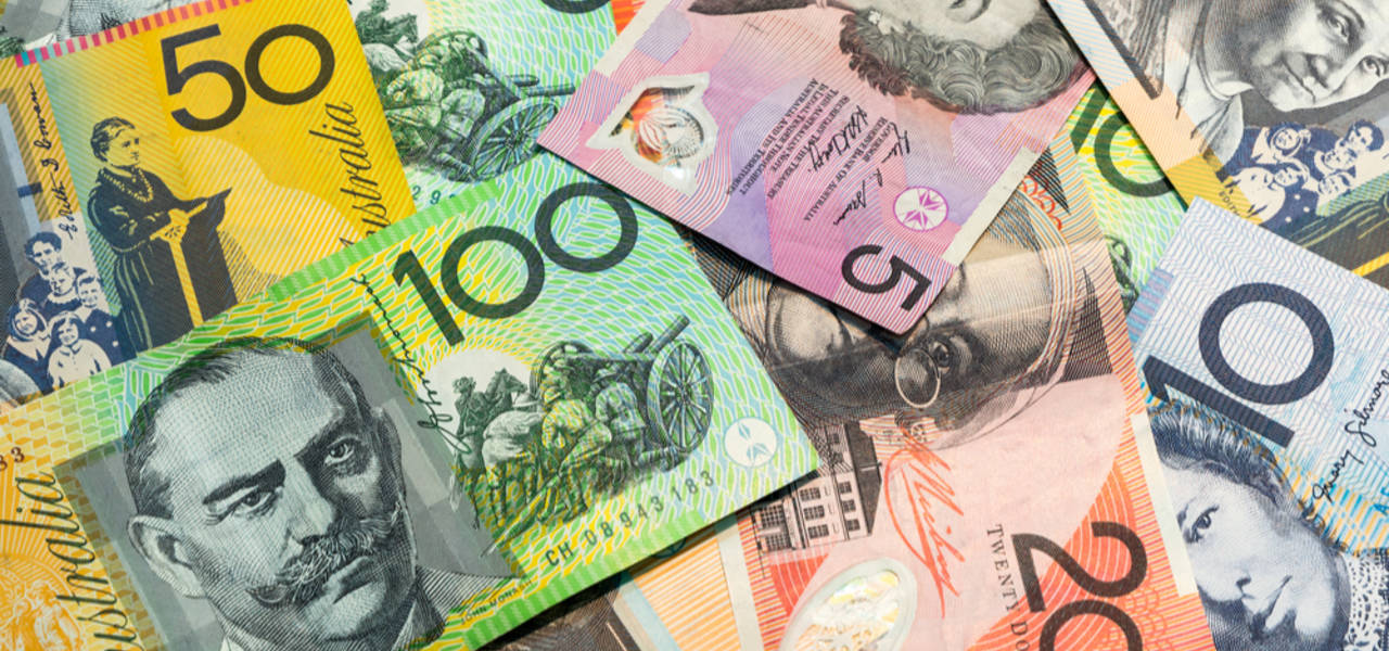 Australian dollar tacks on