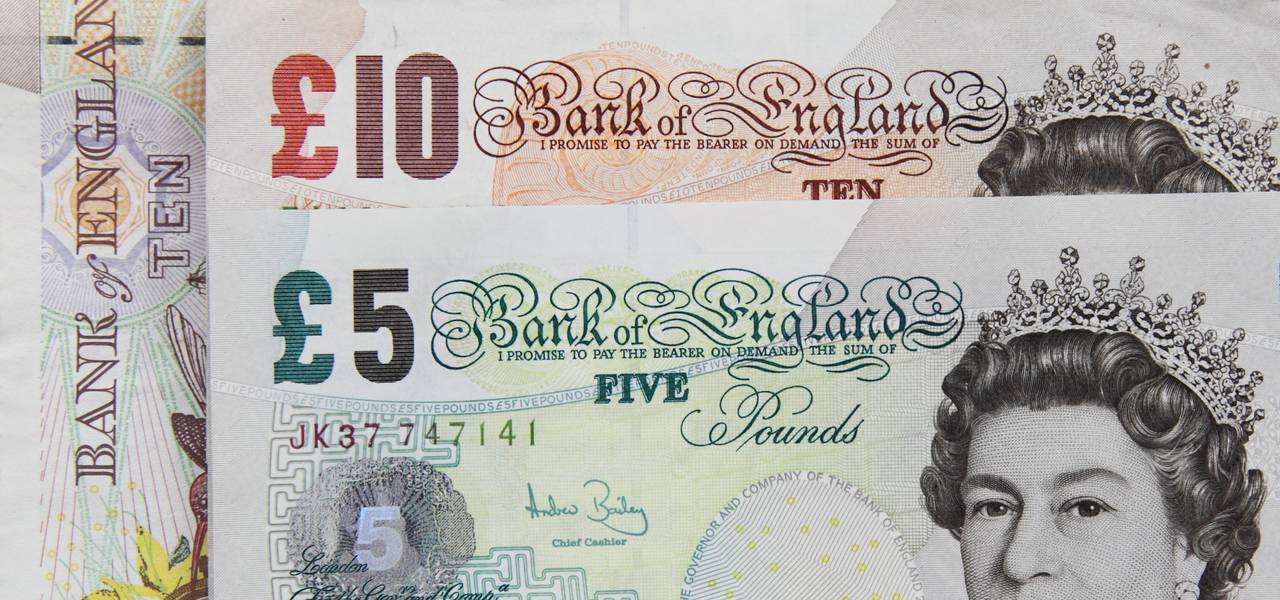 British pound remains lower versus greenback 