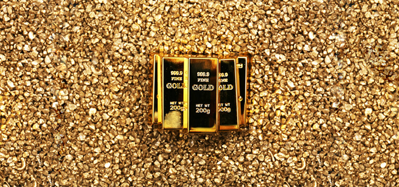 El Oro con moderadas ganancias frente al dolar cerca de mínimos de 1 mes.
